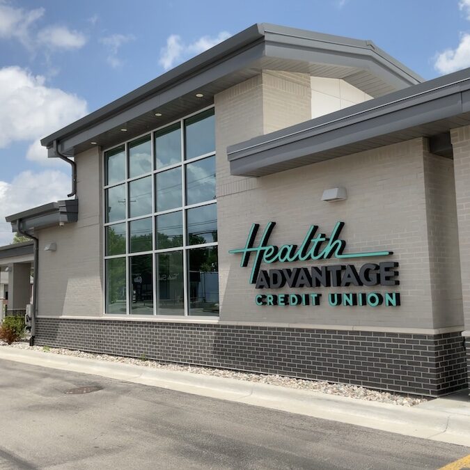 Front of the building of Health Advantage Credit Union in Midland Michigan. Featuring Vintage Black Velour brick manufactured. Masonry work by Boettcher Masonry.
