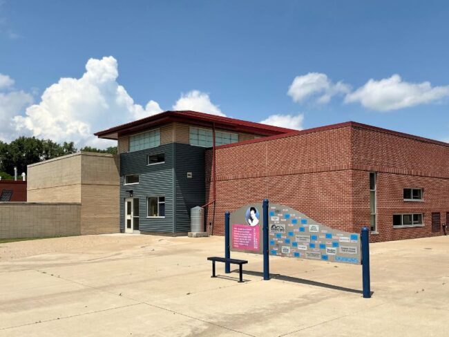 Exterior of Central Park Elementary School in Midland, MI featuring Boettcher Masonry’s brickwork with modern design and welcoming school entrance.